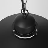 Black modern pendant lamp hanging, featuring sleek metal design with smooth glass shade.