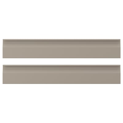 Two beige rectangular boxes with sleek edges and integrated handles, placed horizontally.