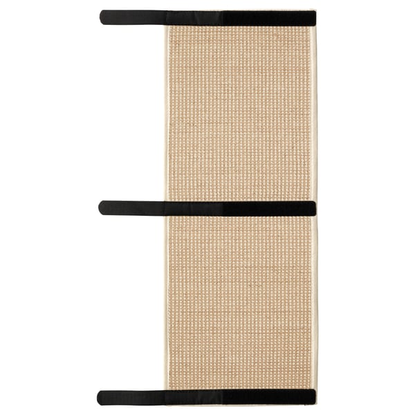 A beige and black UTSÅDD cat scratching mat with straps, designed to wrap around table legs.