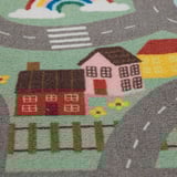 Vibrant, cozy rug with playful house designs, perfect for kids playtime.