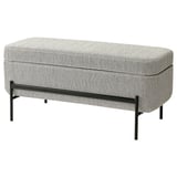 A grey tweed VALTORP bench with a black metal frame and gas-lifted seat for easy storage access.