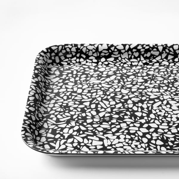 Black and white speckled tray with rounded edges. High-quality design for easy handling and stylish serving.
