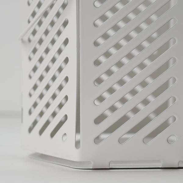 White basket, slanted design, durable.