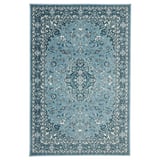 Blue rectangular rug with floral design