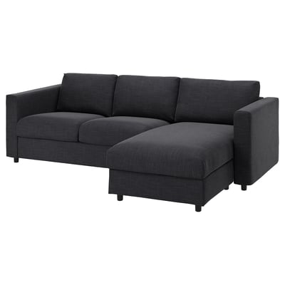 Modern sectional sofa in dark gray, l-shaped, fabric with removable cushions.