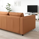Brown leather l-shaped VIMLE sofa with chaise and tv.