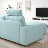 VIMLE light blue sofa, modern minimalist design, includes adjustable headrest, chaise longue, fits well in spacious room with tv.