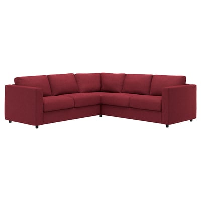 Its a red, l-shaped sofa with a modern design, featuring soft cushions and removable, machine-washable fabric covers.
