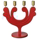 Red VINTERFINT candle holder with four gold candles, geometric shape.
