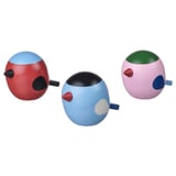 Three colorful wooden bird figurines in red, blue, and pink with black beak and feet, arranged in a triangular formation.