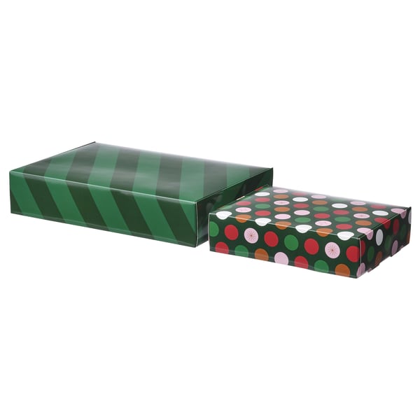 Two green gift boxes, one striped, one polka-dotted, made of paper.