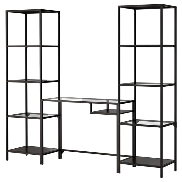 Two modern black metal shelves with glass, one l-shaped.