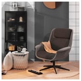 Eleganter, minimalistischer Raum mit grauem drehbarem ÄLEBY-Drehsessel mit verstellbarer Neigung, modernem rundem Beistelltisch und Glastürschrank.