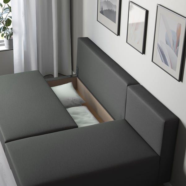 Modernes Sofa mit ausklappbarem Bett, grauem Stoff, Stauraum, umwandelbare Sitzgelegenheiten.
