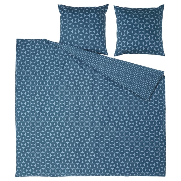 Dunkelblaues Bettwäsche-Set aus Baumwolle und Viskose mit geometrischen Mustern.