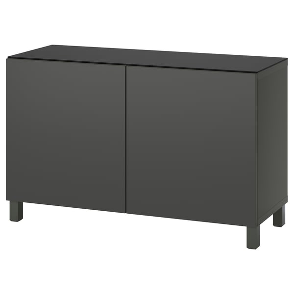 Ein ikea BESTÅ Sideboard in Dunkelgrau mit zwei Türen und quadratischen Beinen.