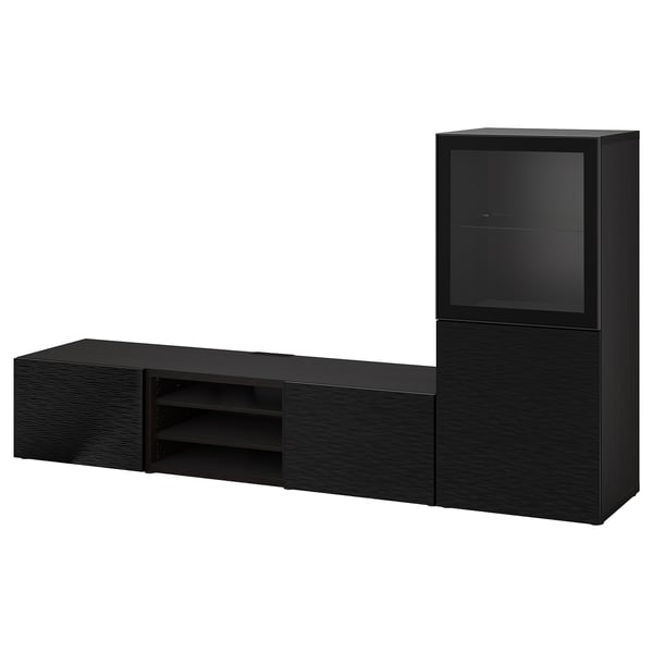 Schwarze BESTÅ TV-Aufbewahrungskombination mit Glasvitrine und Regal, schlankes, modernes Design.