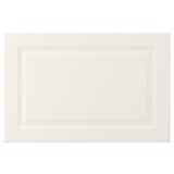 Eine cremefarbene Schranktür mit abgeschrägter Platte, glatt lackierter Oberfläche und traditionellem Design. Es ist rechteckig mit einem einfachen Rahmen.