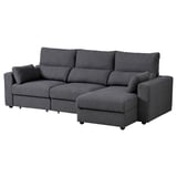 Graues ESKILSTUNA Sofa, bequemes und verstellbares Design mit hoher Rückenlehne, Stoff- und Holzstruktur.