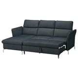Dunkelgraues FAMMARP-Sofa mit verstellbaren Kopfstützen, schlanken Metallbeinen und einer Chaiselongue-Verlängerung.