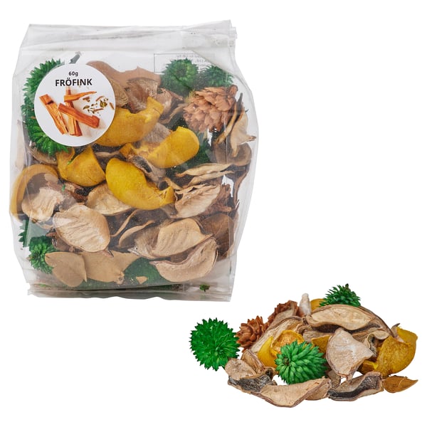 Beutel mit getrockneten gelben Blütenblättern und grünen Blättern. Marke: FRÖFINK.