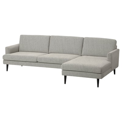 Ein modernes graues GRILLSTORP-Sofa mit Chaiselongue, klaren Linien und bequemen Kissen.