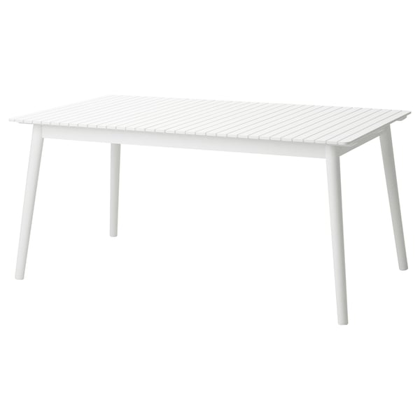 Weißer ausziehbarer Esstisch mit Lattenplatte und vier gespreizten Beinen, modernes Design.