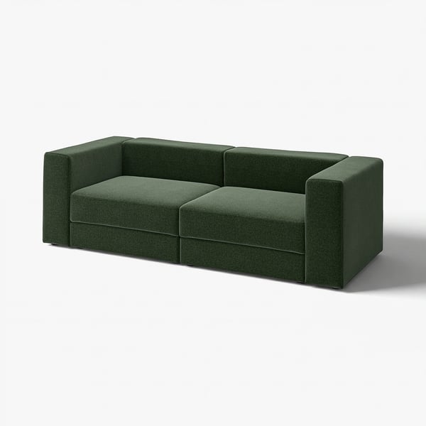 Grünes JÄTTEBO-Modulsofa mit tiefen Sitzen und klaren Linien.