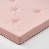 Weiche, weiche Matratzenauflage in hellrosa Farbe mit hochwertigem Baumwollgewebe und dicker Polyurethanschaumfüllung für mehr Komfort.