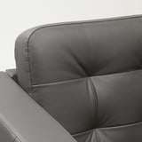 Detail eines dunkelgrauen Ledersofas; glattes, dickes Narbenleder, saubere Nähte, hochwertige Verarbeitung.