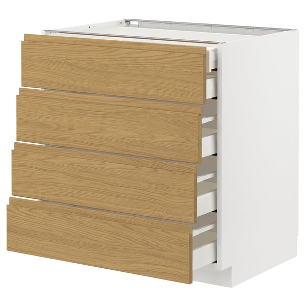 Ein weißer METOD-Küchenschrank mit vier Holzschubladen. Der Schrank hat ein schlankes, modernes Design und ist aus Spanplatten und Stahl gefertigt.
