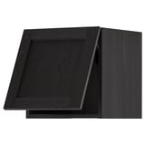 Küchenschrank aus schwarz gebeiztem Holz mit abgeschrägten Kanten und quadratischer Schublade.