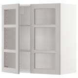 Weißer wandmontierter Küchenschrank mit Glastüren, verstellbaren Regalen.