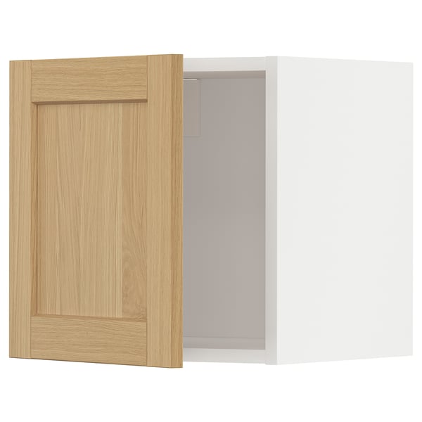 Ikea METOD weißer Wandschrank mit heller Holztür, klassisches Schrägendesign.