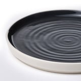 Schwarze Drallplatte, weißer Rand