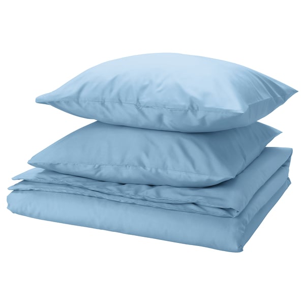Ein Stapel blauer, rechteckiger, recycelter Polyester-/Viskose-Bettwäsche.