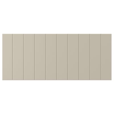 Beige SUTTERVIKEN Aufbewahrungsschrank mit Holzpaneelen, helles rechteckiges Design.