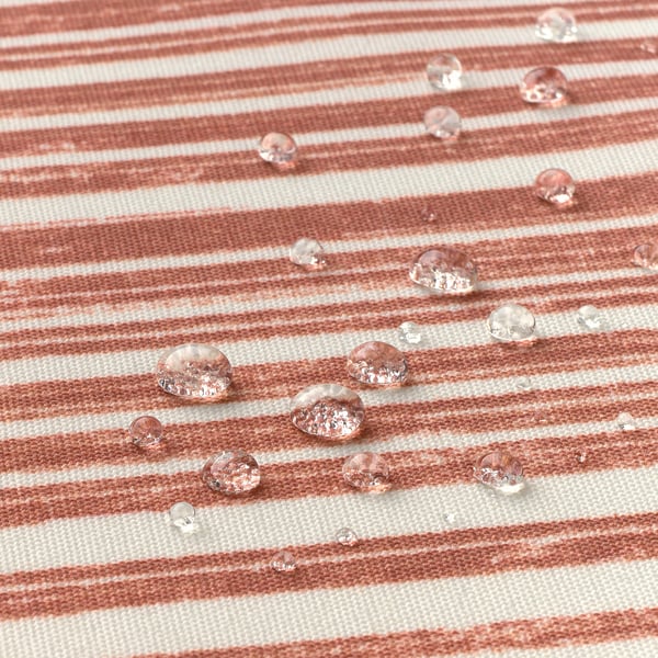Gestreifte wasserfeste Tischdecke mit Tröpfchen, leicht zu reinigen.