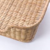 Handgeflochtenes Hundebett aus Rattan mit kompliziertem, dichtem Gewebe und robustem, abgerundetem Design.