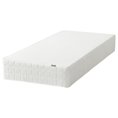 Rechteckige weiße Schaumstoffmatratze von IKEA mit gesteppten Seiten, wahrscheinlich VATTAO-Modell.