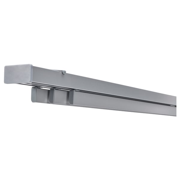 Eine graue VIDGA-Dreischienenschiene aus Aluminium und Kunststoff, die für Flächenvorhänge entwickelt wurde.