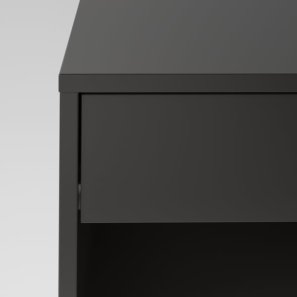 Moderner schwarzer Schrank mit glatten, leisen Schubladen, Teil der VIKHAMMER-Serie.