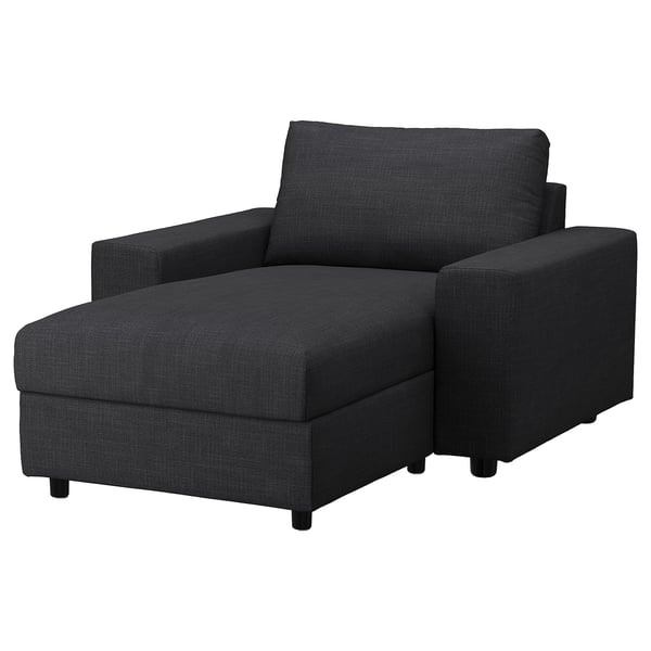 Ein VIMLE Sofa aus schwarzem Stoff mit eingebautem Stauraum, schlankem Design und modernem Stil.