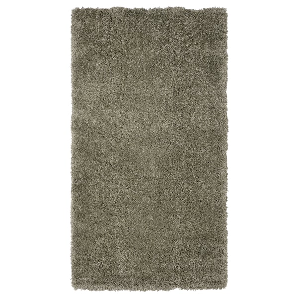 Ein zotteliger Teppich von VOLLERSLEV in Grau aus recyceltem Polyester und Polypropylen mit einer weichen, strukturierten Oberfläche.