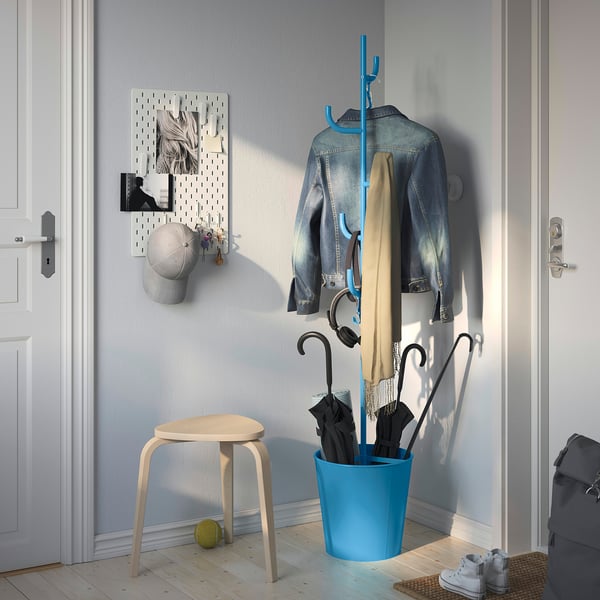 ÄLGANÄS blue coat stand holds lots of items. Sized between the stool and door, its perfect for small spaces.