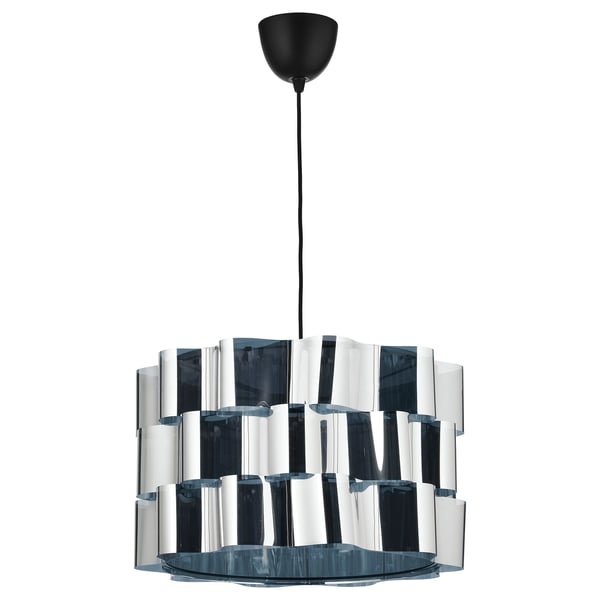 Modern silver pendant lamp with wavy design. Steel frame, pet plastic shade. Hangs from black cord, emits soft light.