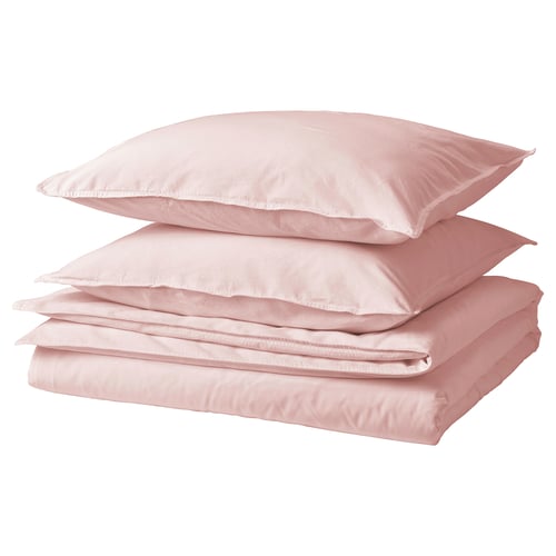 Folded pink cotton bed sheets with two pillows on white background.