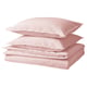 Folded pink cotton bed sheets with two pillows on white background.