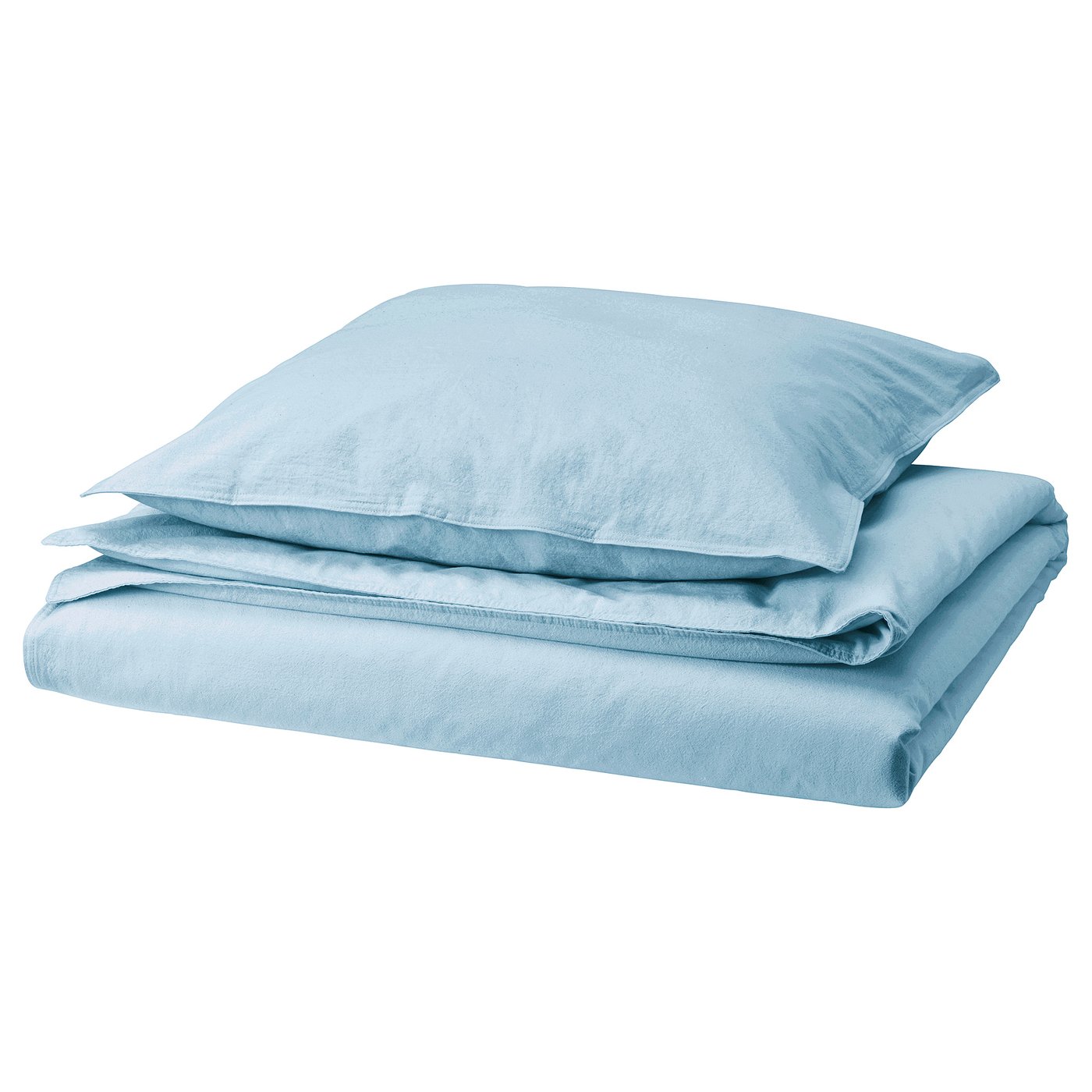 Light blue bed linen set neatly folded, with a duvet cover and pillowcases in soft cotton.