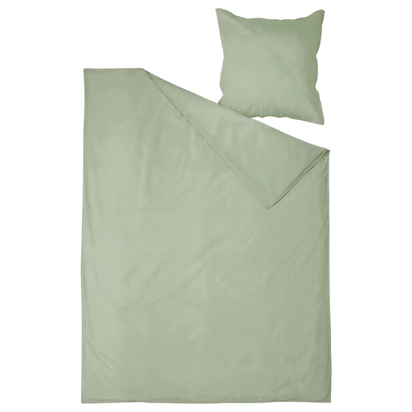 Light green bedding set featuring a duvet cover and a pillowcase, crafted from 100% pre-washed cotton, offering a soft and breathable finish.
